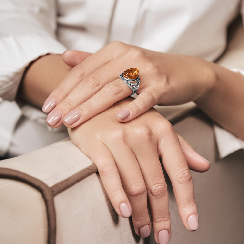 woman-jewelery-concept-woman-hands-close-up-wearing-rings-earrings-necklace-modern-accessories-elegant-life-style
